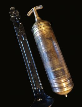 1940s PYRENE PORTABLE FIRE EXTINGUISHER WITH BULKHEAD BRACKET INSTALLED ABOARD THE AVRO LANCASTER
